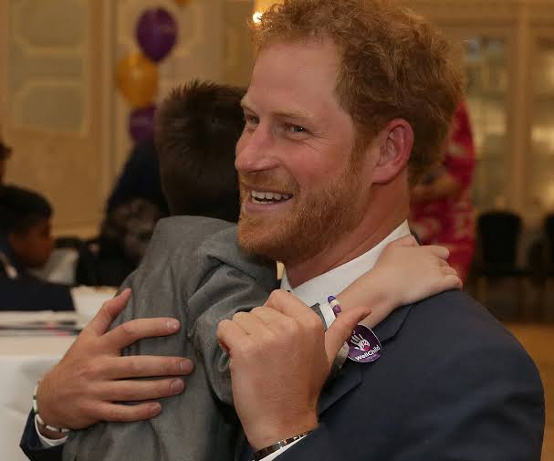 Heartwarming: Prince Harry received a warm embrace from a young boy whose debilitating medical condition means he is barely able to walk... See more 👇👇
