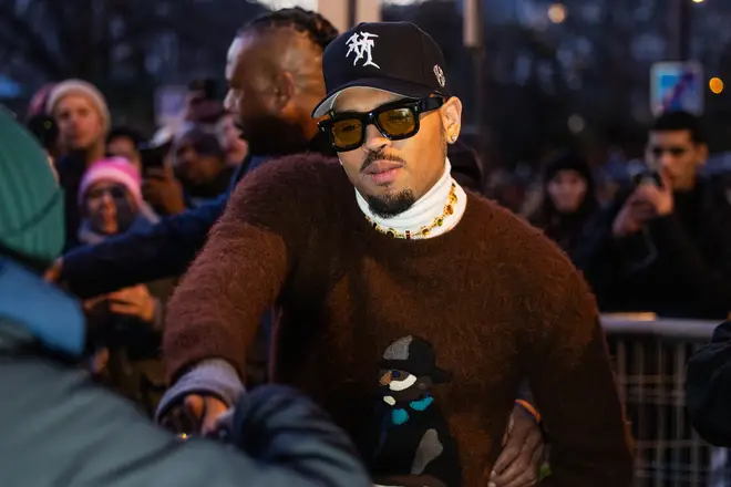 Breaking: Chris Brown held in custody after arrest for alleged grievous bodily harm in London 'bottle attack' incident...