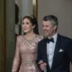 Royal princess: Queen Mary of Denmark is the double of Kate Middleton as she re-wears one of the Princess of Wales's most iconic gowns... See more