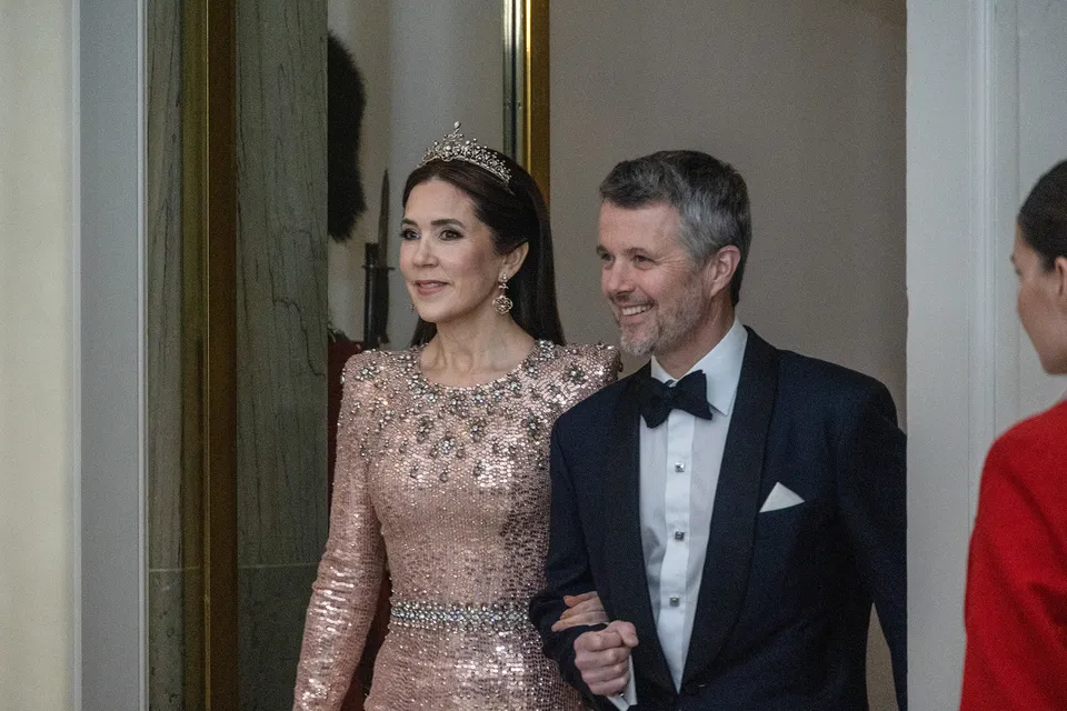 Royal princess: Queen Mary of Denmark is the double of Kate Middleton as she re-wears one of the Princess of Wales's most iconic gowns... See more